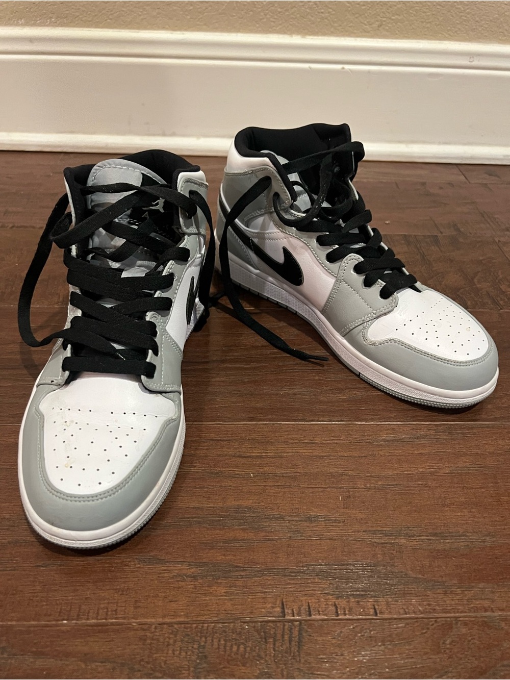 Nike High-Top Sneakers in White, Light Gray, and Black